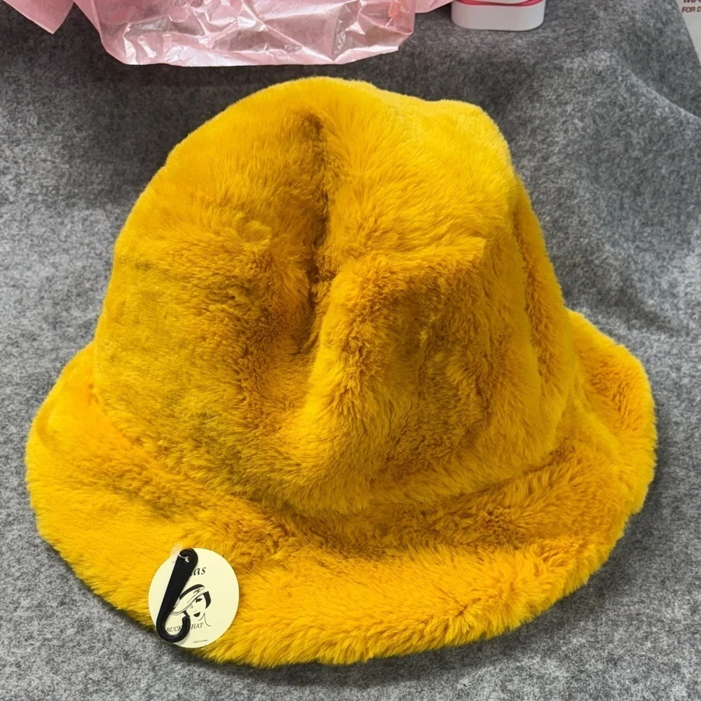 Ellas mustard yellow or bubble gum pink  faux fir look lined warm bucket hat